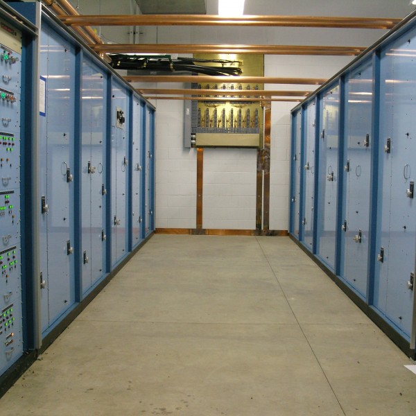 Phasor shown in transmitter room with bulkhead grounding panel shown on wall